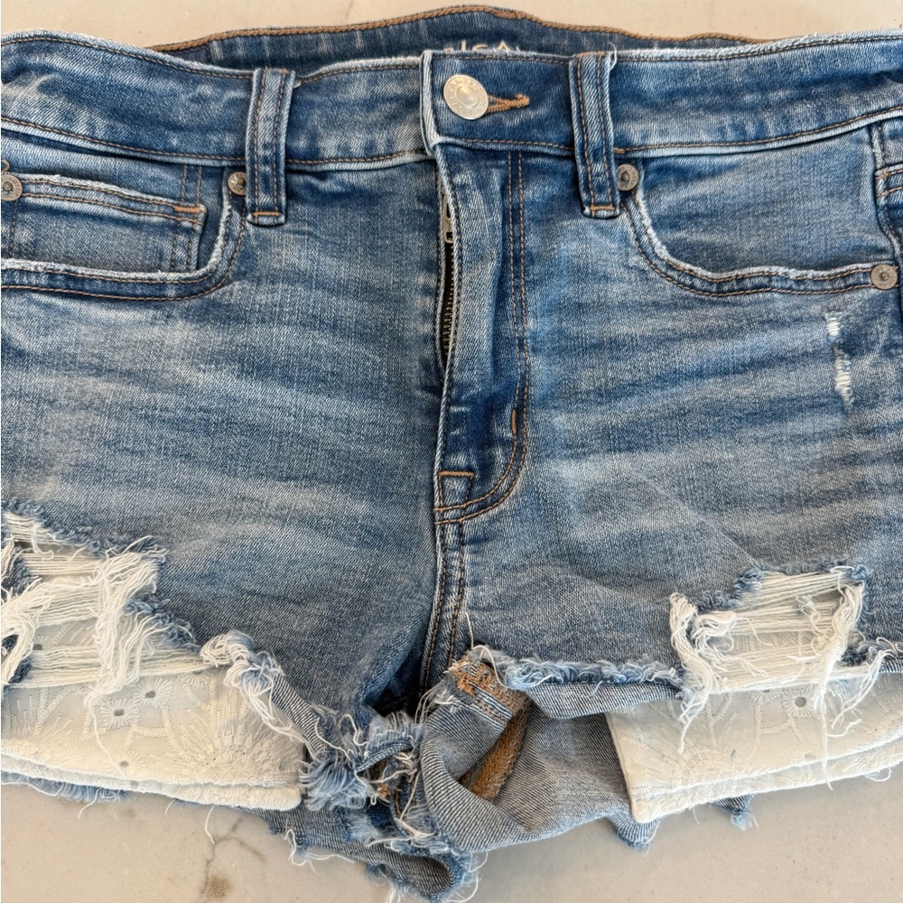 American Eagle Outfitters stretch Blue Distressed eyelet pocket Jean Shorts sz 2